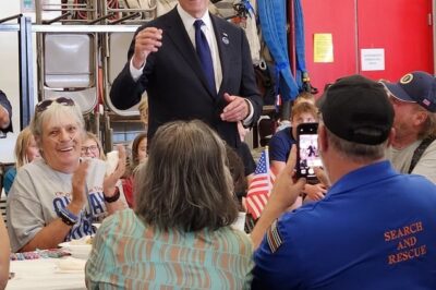 Bizarre moment Biden puts on a Trump hat at a fire station: White House offers explanation for Joe’s gesture on 9/11